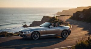 BMW Z4 roadster convertible parked on coastal road at sunset, symbolizing the end of an automotive era