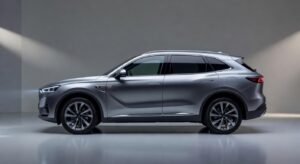 Omoda & Jaecoo hybrid SUV in modern showroom with dramatic lighting showcasing sleek design and hybrid technology details