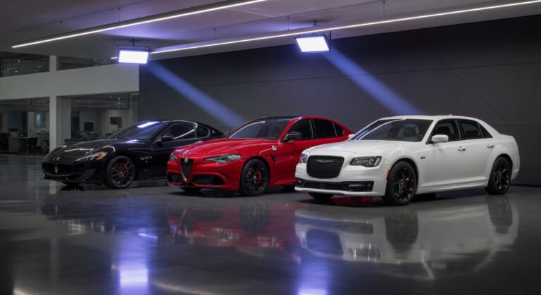 Luxury vehicles from Stellantis brands Maserati, Alfa Romeo and Chrysler displayed together in modern showroom setting
