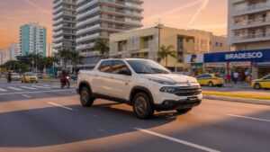 Fiat Toro 2027 hybrid pickup truck driving through urban city streets in golden hour light