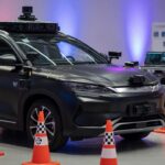 BYD electric vehicle equipped with autonomous driving sensors and safety technology in professional test environment