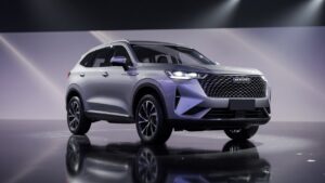 GWM Haval H6 2027 SUV in silver displayed in professional studio setting with dramatic lighting