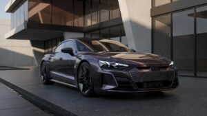Audi RS e-tron GT Performance em ângulo frontal três quartos, destacando design aerodinâmico e linhas esportivas do sedã elétrico de luxo