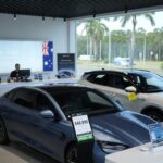 BYD electric vehicles displayed in an Australian car dealership showroom